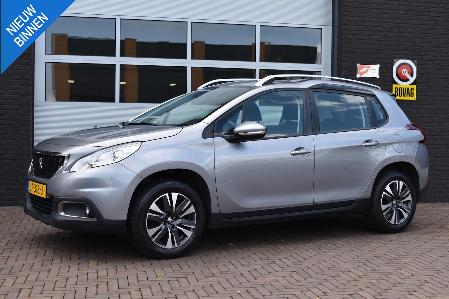 Peugeot 2008 - 1.2 PureTech Active | Navi | Trekhaak - AutoWereld.nl