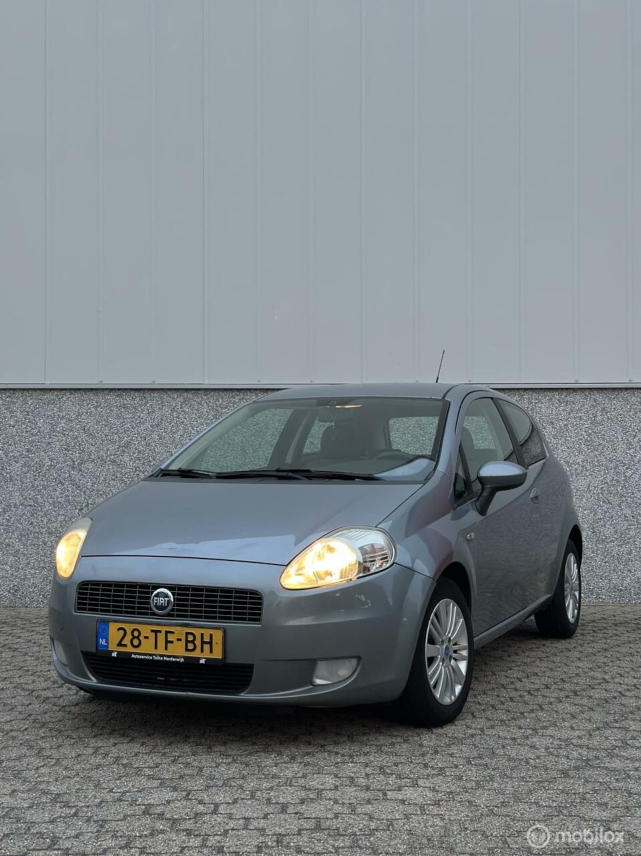 Fiat Grande Punto - 1.4 Edizione Blue & Me / Airco - AutoWereld.nl