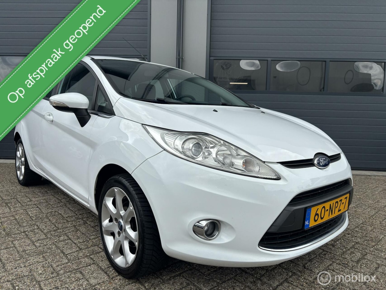 Ford Fiesta - 1.25 Titanium Uitvoering _ 2e Eigenaar NL Auto - AutoWereld.nl