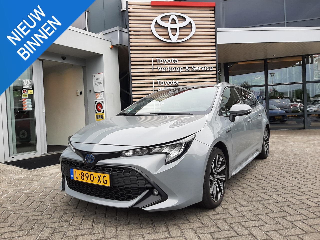 Toyota Corolla Touring Sports - 1.8 Hybrid Dynamic NL-AUTO TREKHAAK KEYLESS DAB+ APPLE/ ANDROID CAMERA AD-CRUISE - AutoWereld.nl