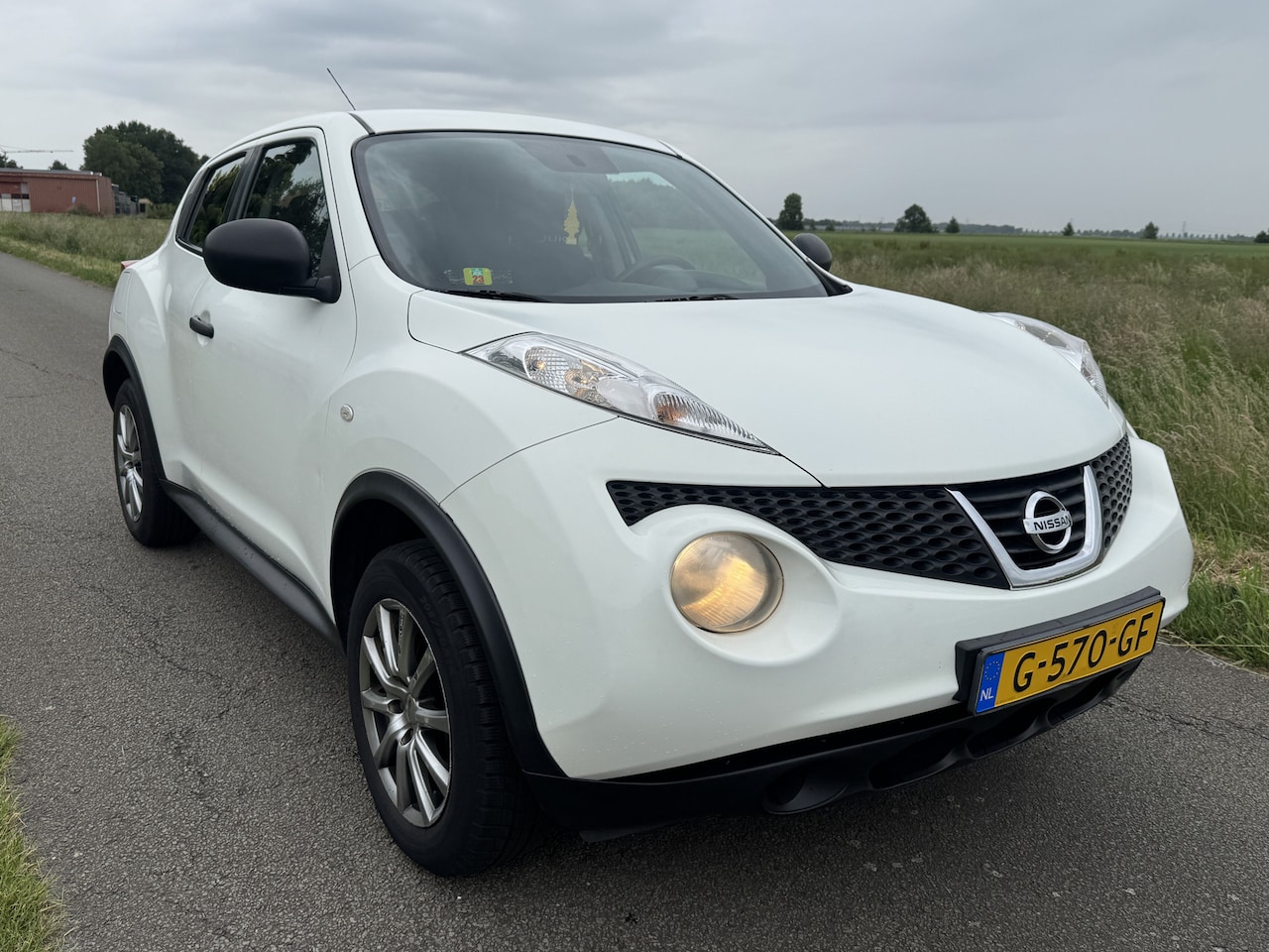 Nissan Juke - 1.6 Visia Airco/Navi/LMV - AutoWereld.nl