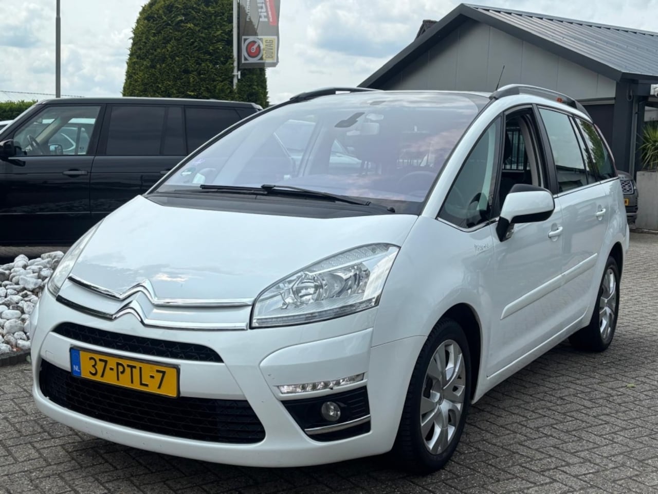 Citroën Grand C4 Picasso - 1.6 Benzine 2011 7-Persoons Facelift Wit - AutoWereld.nl