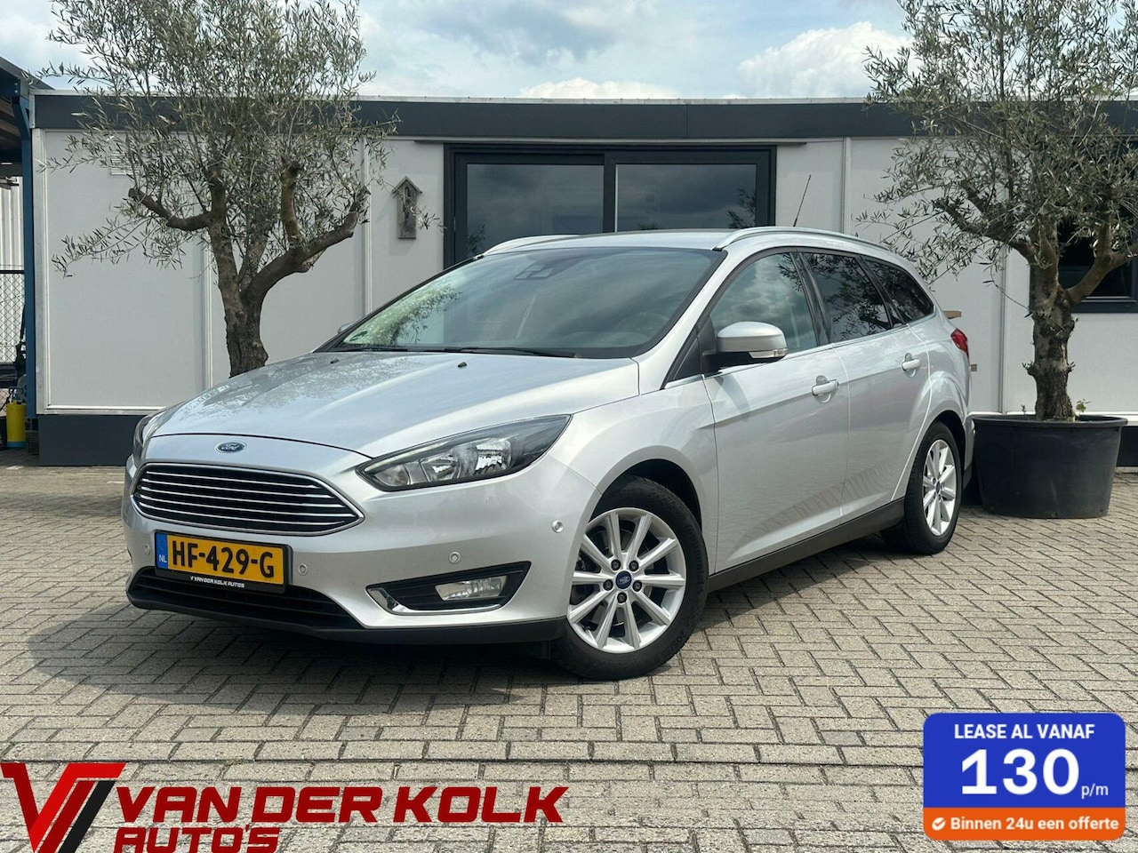 Ford Focus Wagon - 1.5 Titanium Navi LED Cruise Climate Stuur/Stoelverwarming Sensoren - AutoWereld.nl