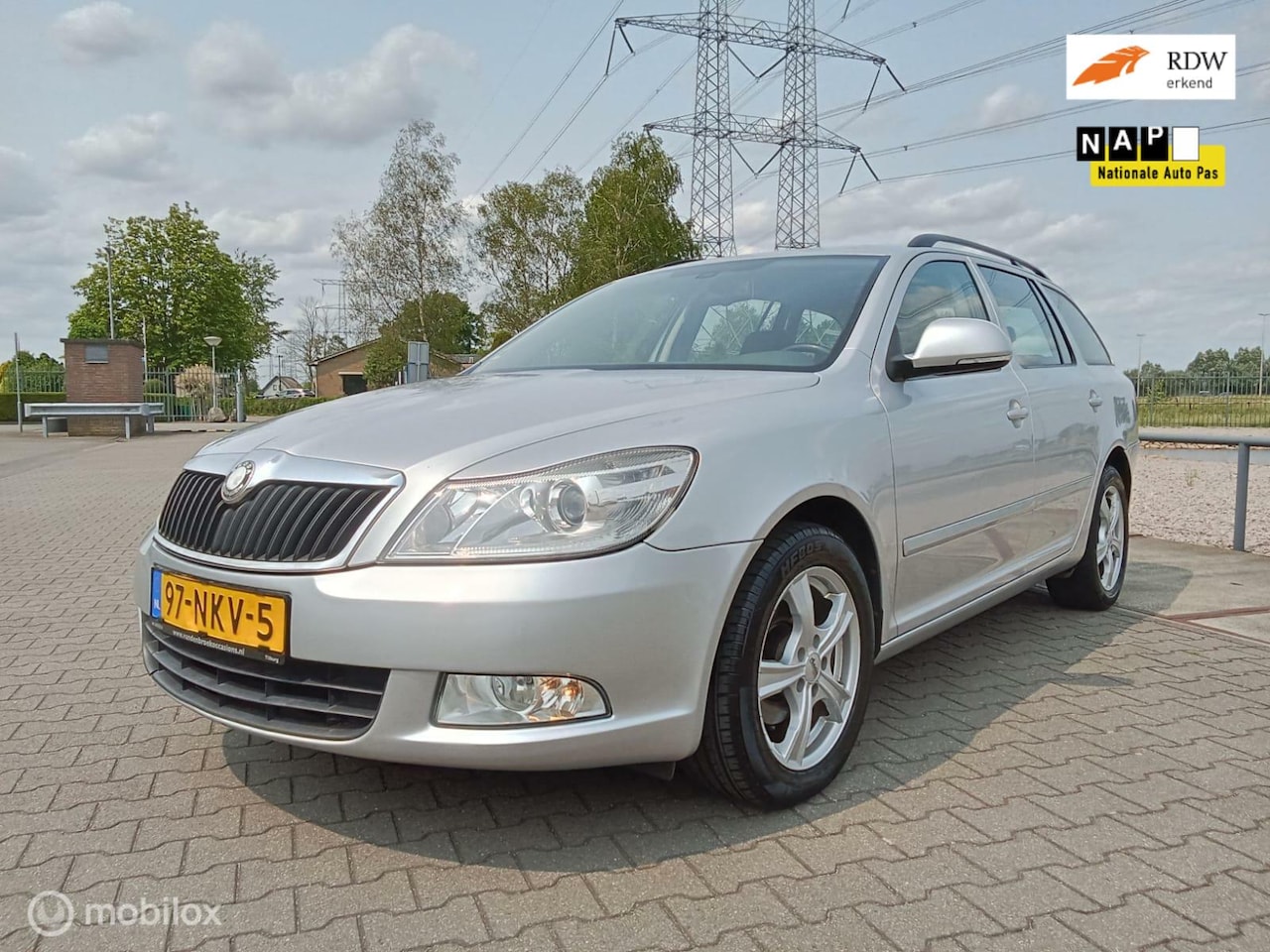 Skoda Octavia Combi - 1.2 TSI automaat/airco/navi/trekhaak - AutoWereld.nl