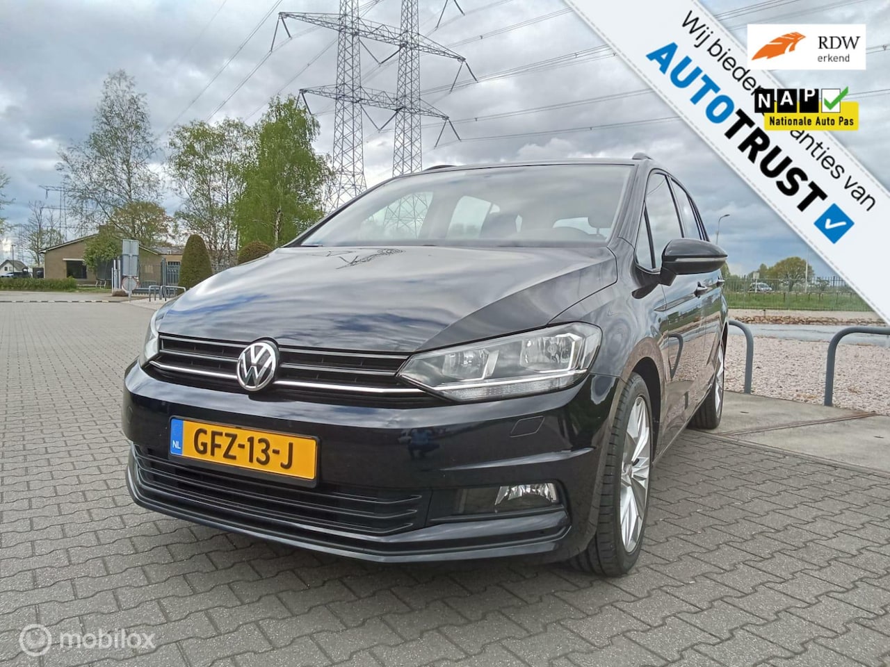 Volkswagen Touran - 1.2 TSI Comfortline/7p/Navi/Clima/garantie - AutoWereld.nl