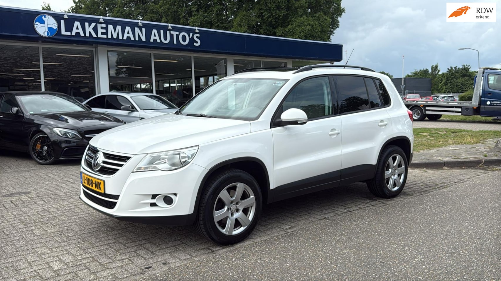 Volkswagen Tiguan - 2.0 TSI Comfort&Design 4Motion Whiteline Huurkoop Inruil APK Garantie - AutoWereld.nl