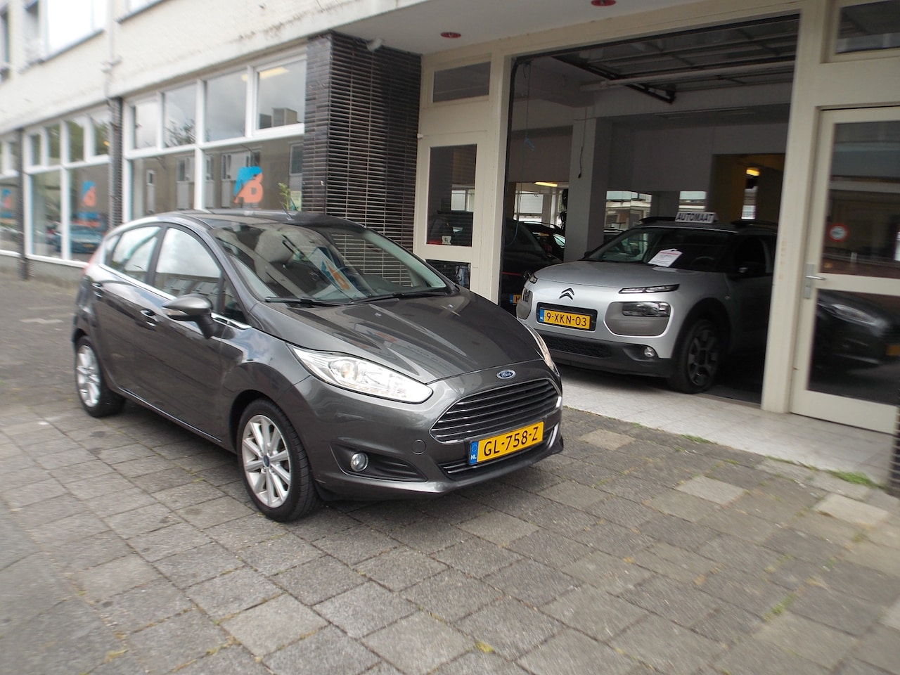 Ford Fiesta - 1.0 EcoBoost Titanium NAVI  LM VELGEN   CAMERA  CRUISE  53 DKM!!! - AutoWereld.nl