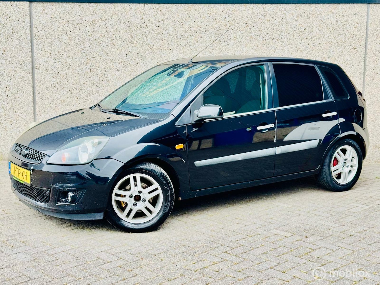 Ford Fiesta - 1.3-8V Style*Airco*Carplay* - AutoWereld.nl