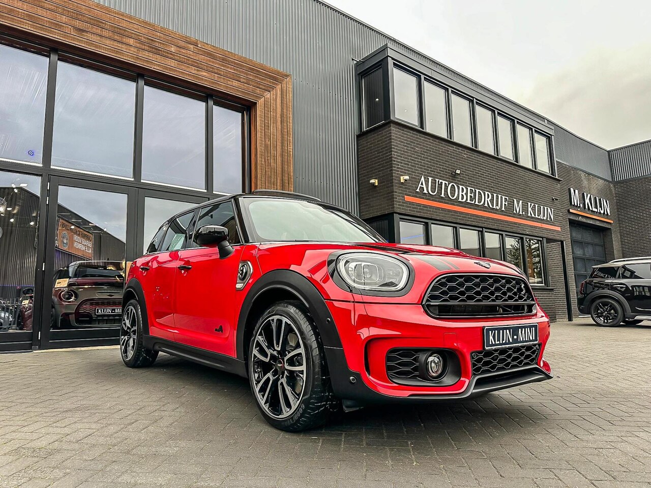 MINI Countryman - Mini 2.0 Cooper S E ALL4 John Cooper Works 220pk Aut/Camera/Lounge Leer/Pano/19"Jcw - AutoWereld.nl