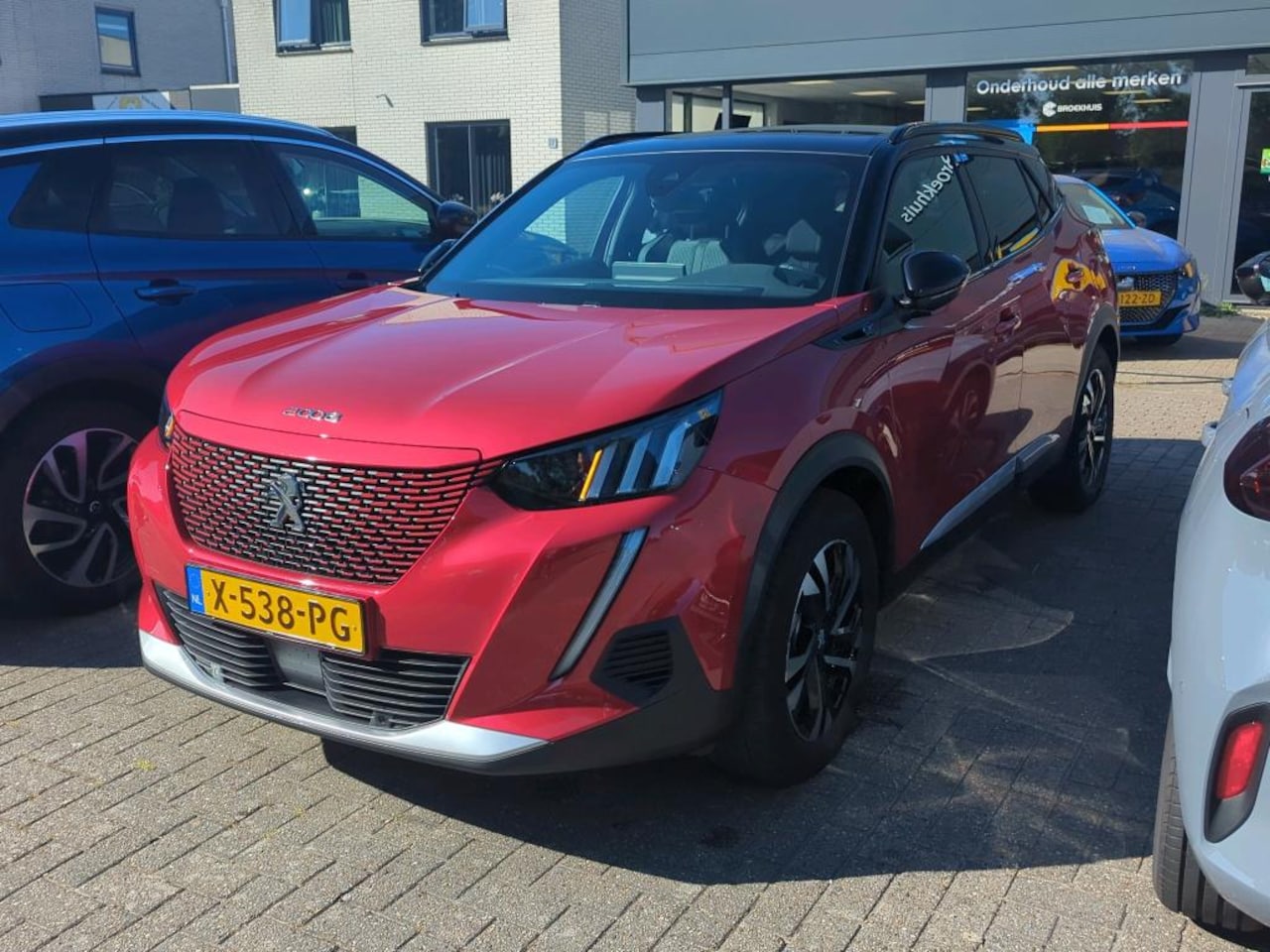 Peugeot e-2008 - EV GT 50 kWh | Navi | Clima | Adaptive Cruise | Schuifkantel/dak | Stoelverwarming | | Ach - AutoWereld.nl