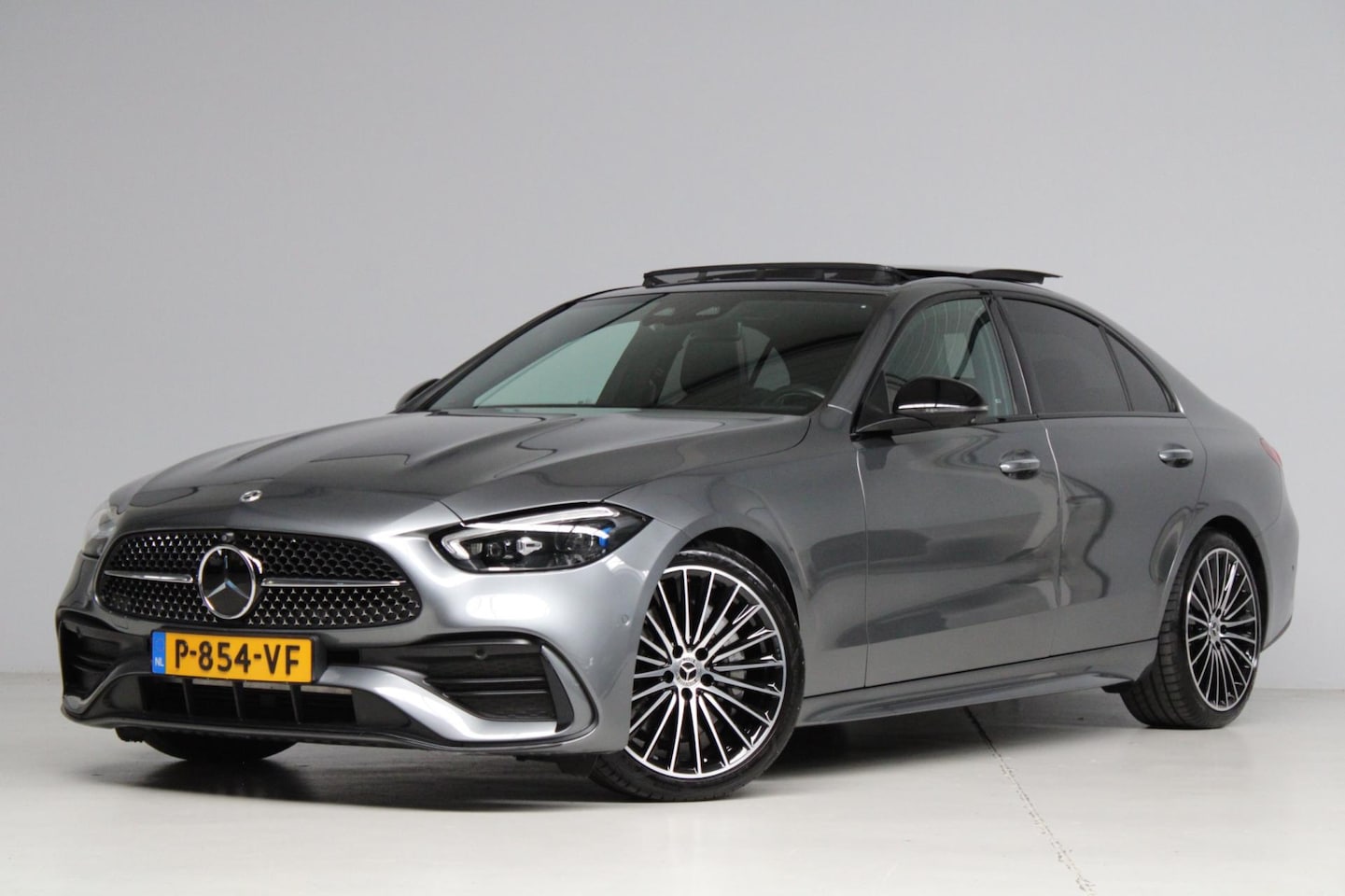 Mercedes-Benz C-klasse - 300 4MATIC AMG [ panoramadak achteras besturing head-up adap. cruise massage stoelen ] 1e - AutoWereld.nl