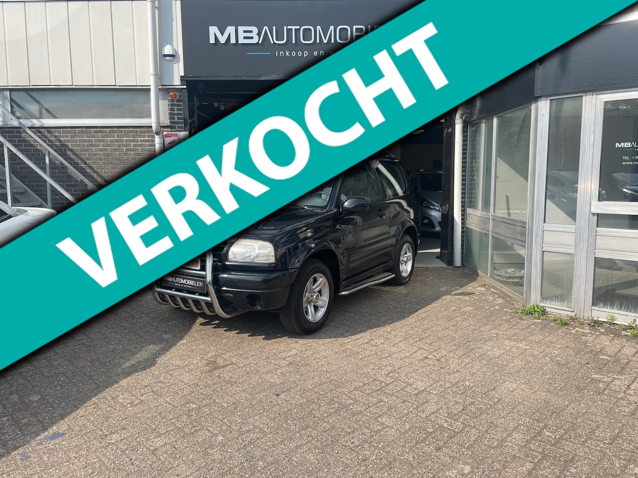 Suzuki Grand Vitara - 1.6 Metal Top Wide Body/Airco/side Bars/Trekhaak/2e Eigenaar! - AutoWereld.nl