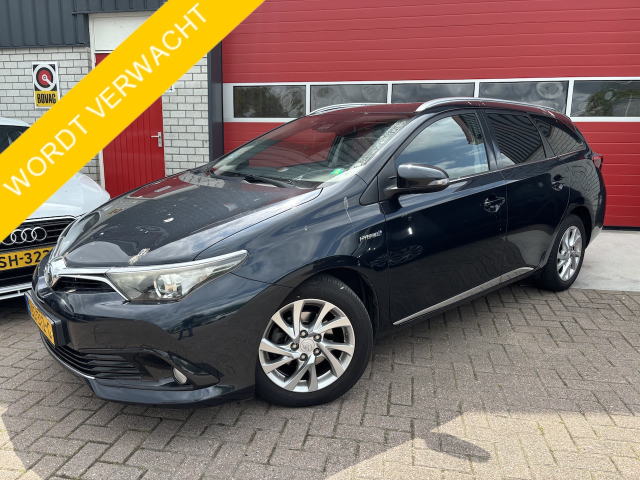 Toyota Auris Touring Sports - 1.8 Hybrid Dynamic CAMERA / CLIMA / BLUETOOTH / CRUISE / ELEK RAMEN / NL-AUTO - AutoWereld.nl