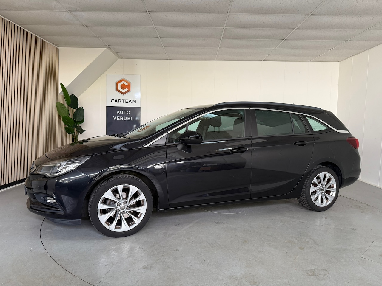 Opel Astra Sports Tourer - 1.0 Edition Airco, LMV, Navigatie, Trekhaak - AutoWereld.nl