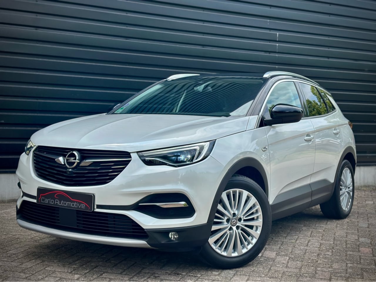 Opel Grandland X - 1.2 Turbo Bns Exec. AUT|BLINDSPOT|360CAM|CARPLAY - AutoWereld.nl