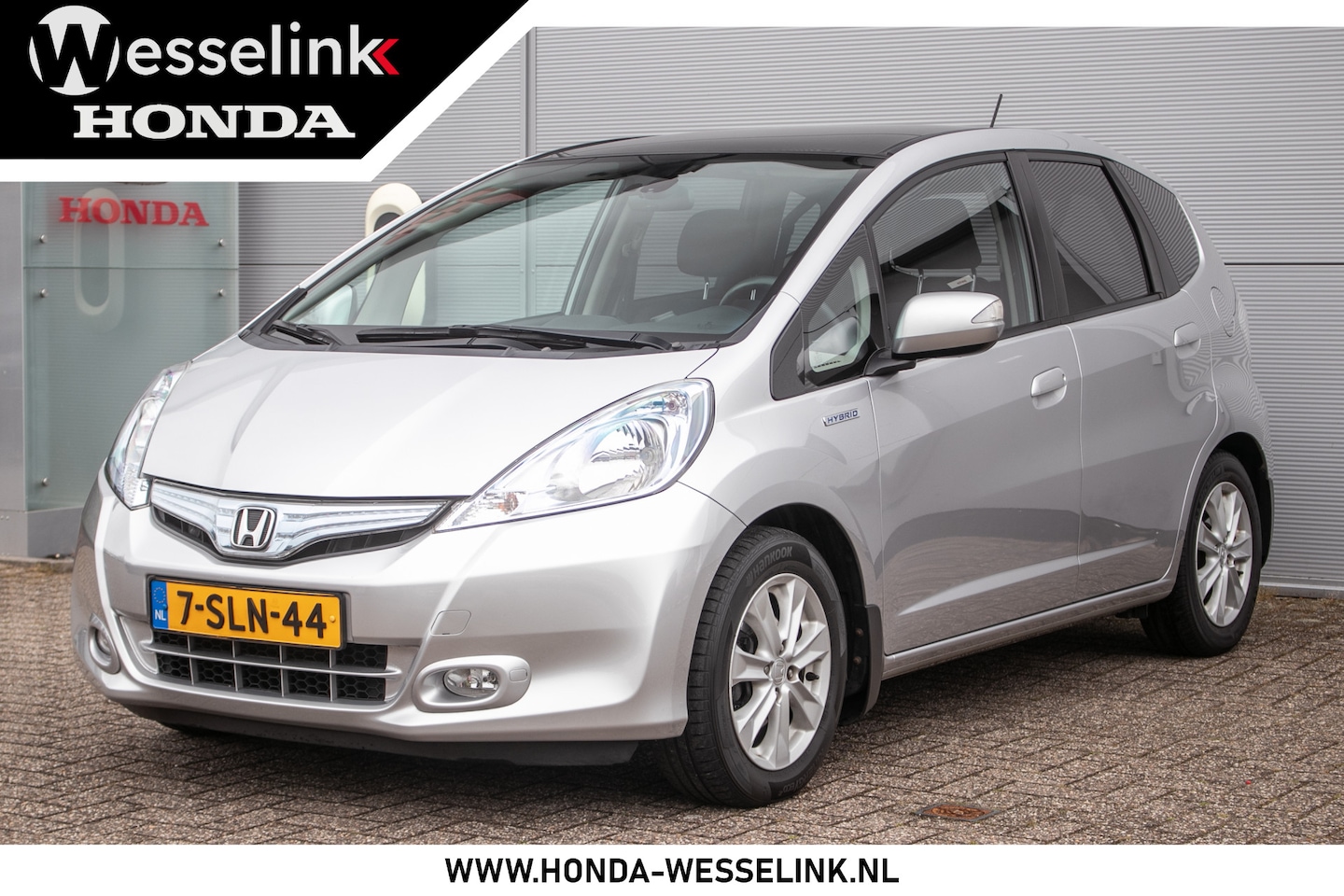 Honda Jazz - 1.4 Hybrid Elegance All-in rijklaarprijs | Dealerond. | Pano | Cruise | Clima - AutoWereld.nl