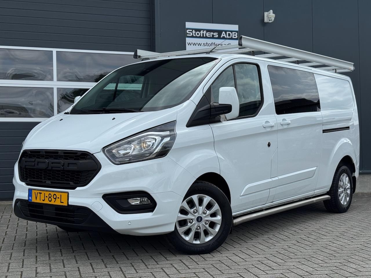 Ford Transit Custom - 2.0 TDCI 130pk L2H1 Limited DC 5P | Navi | Camera | Leder | Trekhaak | Raptor Grill | CarP - AutoWereld.nl