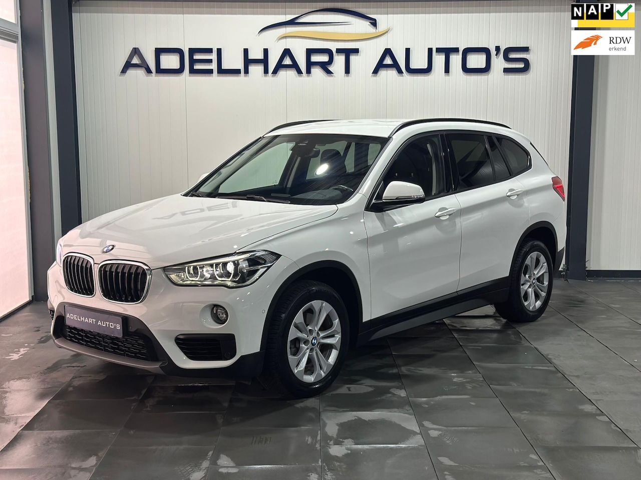 BMW X1 - SDrive18i Executive Automaat / Cruise control / Climate control / Elektrische koffer - AutoWereld.nl