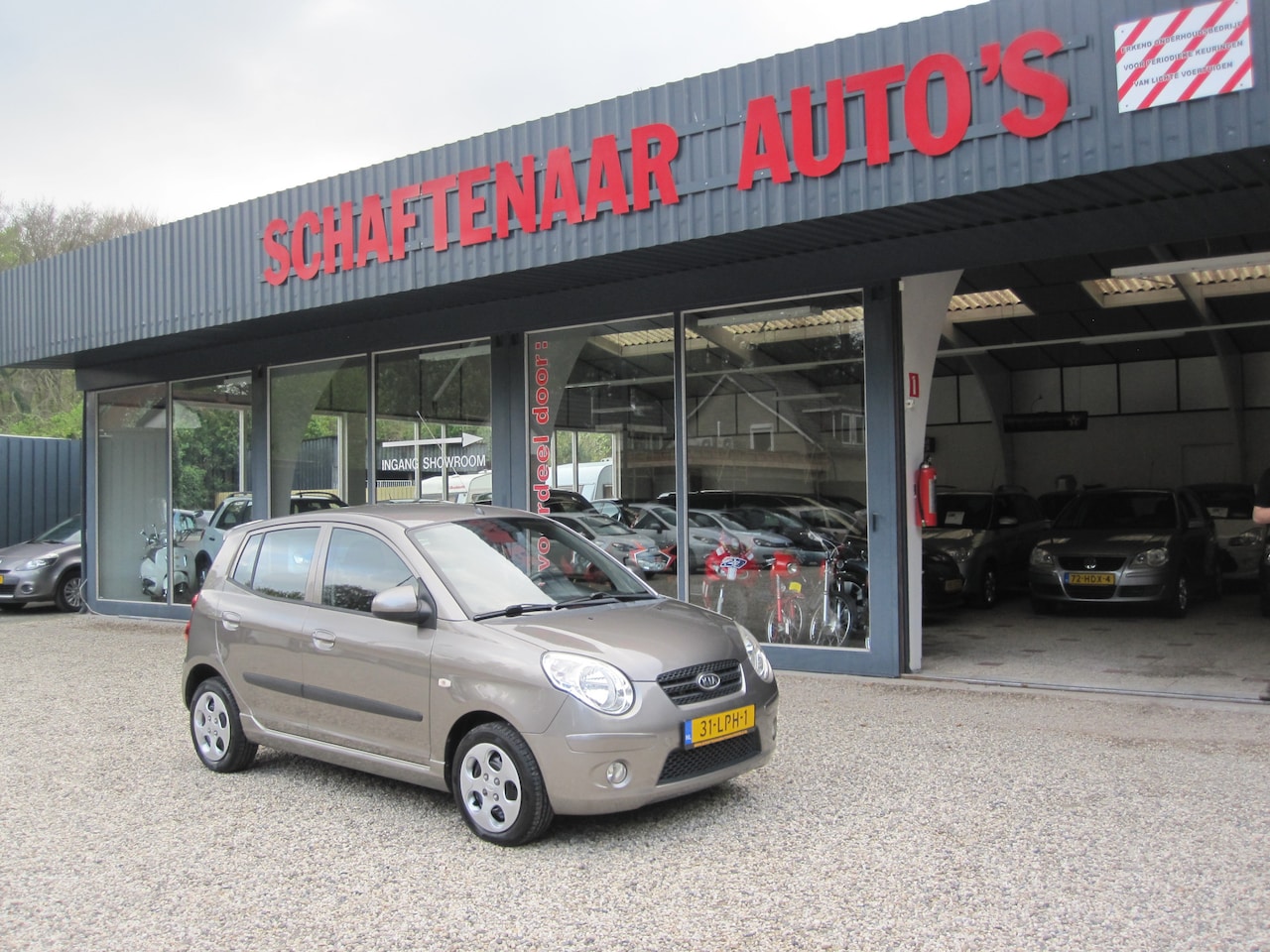 Kia Picanto - 1.0 Seven zeer mooi wordt afgeleverd met nieuwe apk - AutoWereld.nl