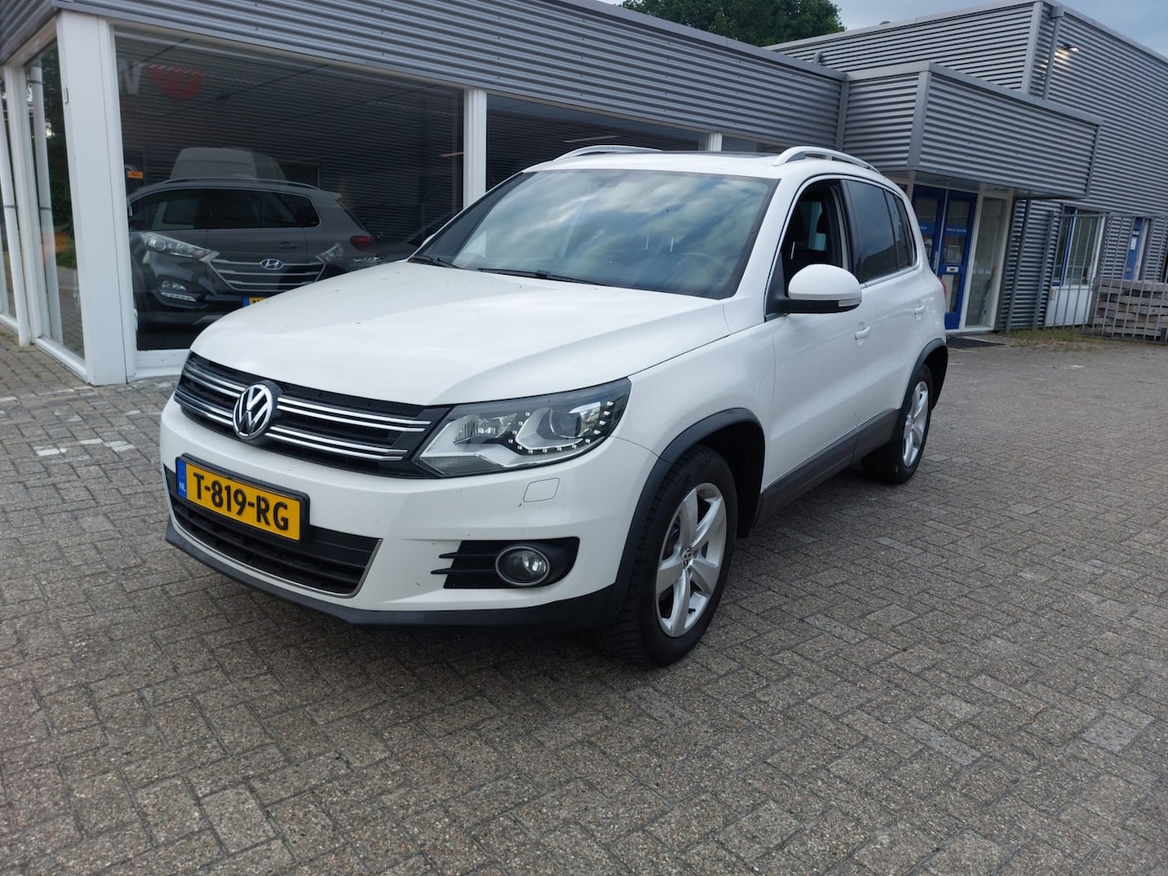 Volkswagen Tiguan - 1.4 TSI Sport&Style - AutoWereld.nl