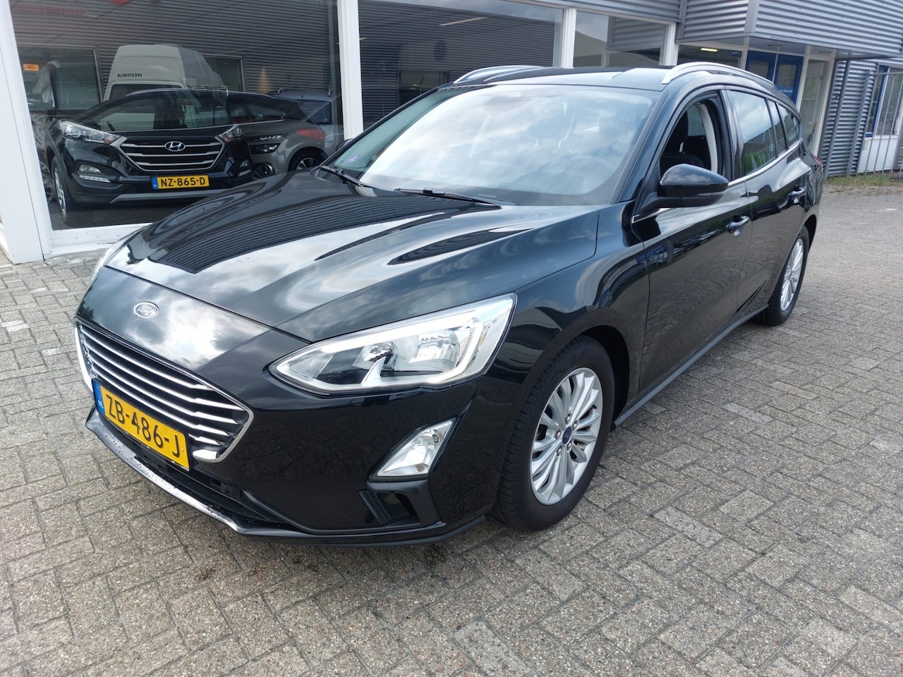 Ford Focus - 1.5 EcoBoost Titanium Business 1.5 Ecoboost Titanium Business - AutoWereld.nl