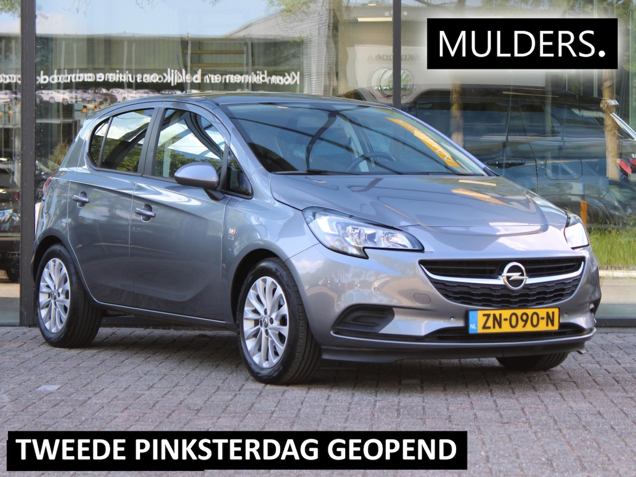 Opel Corsa - 1.0 Turbo 120 Jaar Edition | Navi / Camera / Stoelverwarming - AutoWereld.nl