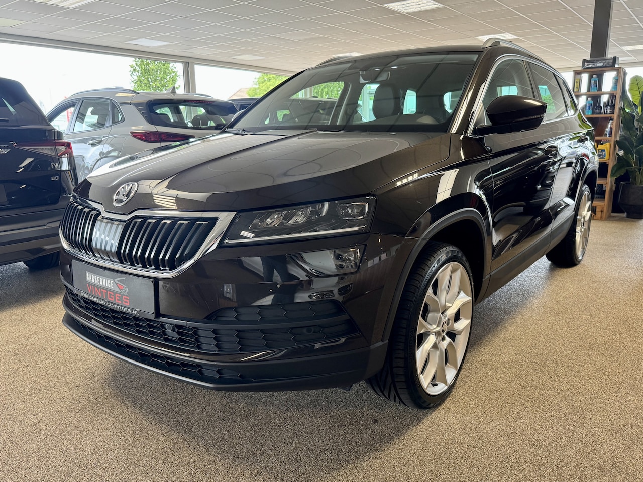 Skoda Karoq - 1.5 TSI ACT Sportline Business Virtuel-cockpit, Navigatie, Memory, PDC, Camera, Clima, Cru - AutoWereld.nl