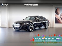 BMW i4 - eDrive40 | M Sport | Stoelverwarming | Glazen Schuif-/kanteldak | Achteruitrijcamera | Sel