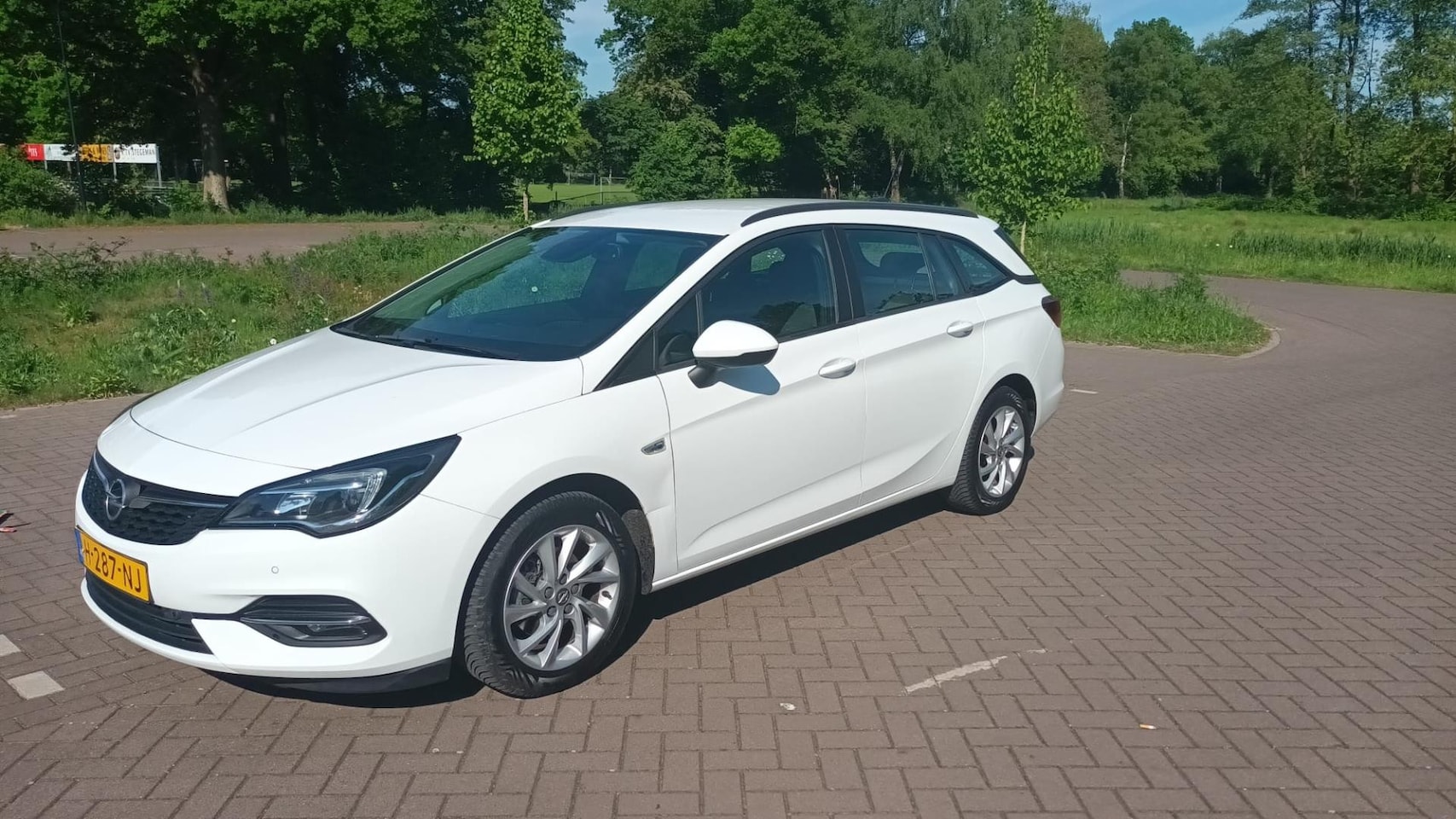 Opel Astra Sports Tourer - 1.2 Clima,cruise,navi, PDC, 6 versnellingen - AutoWereld.nl