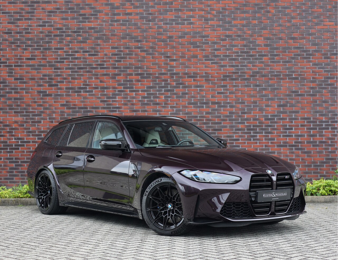 BMW 3-serie Touring - M3 xDrive Competition *Belladonna Purple* - AutoWereld.nl