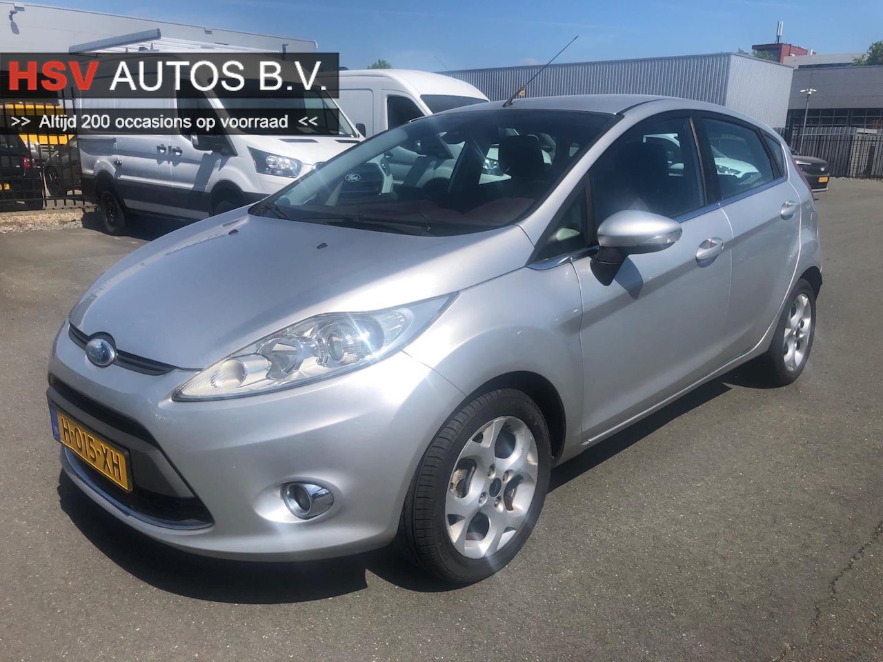 Ford Fiesta - 1.4 Ghia airco LM 4-deurs 2e eigenaar - AutoWereld.nl