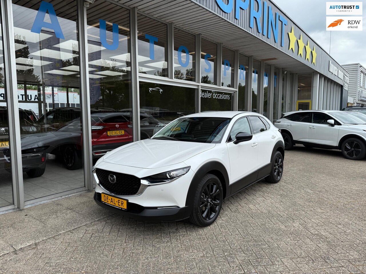 Mazda CX-30 - 2.5 e-SkyActiv-G M Hybrid Homura 140PK / NAVIGATIE / HEAD-UP DISPIAY - AutoWereld.nl