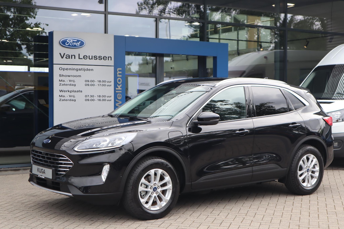 Ford Kuga - 2.5 PHEV TITANIUM WINTERPACK B&O-AUDIO KEYLESS P-SENSOREN NAVI EL-ACHTERKLEP EL-STOELEN - AutoWereld.nl