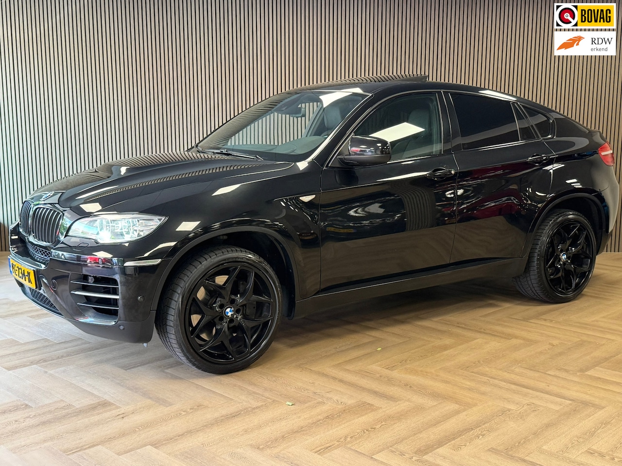 BMW X6 - M50d AUT. SCHUIFDAK LEDER NAVIGATIE CAMERA PDC CRUISE HEAD-UP STOELVERWARMING - AutoWereld.nl