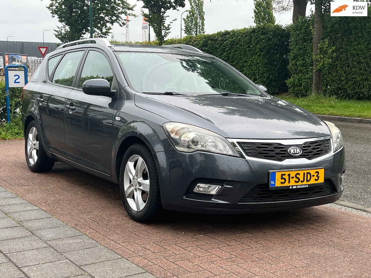 Kia Cee'd Sporty Wagon - 1.4 CVVT Plus *Trekhaak | Navi| Incl. nwe APK! - AutoWereld.nl
