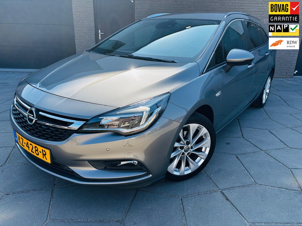 Opel Astra Sports Tourer - 1.0 Online Edition |CLIMATE CONTROL | CRUISE CONTROL | NAVI | ELEK. RAMEN | LANE ASSIST | - AutoWereld.nl