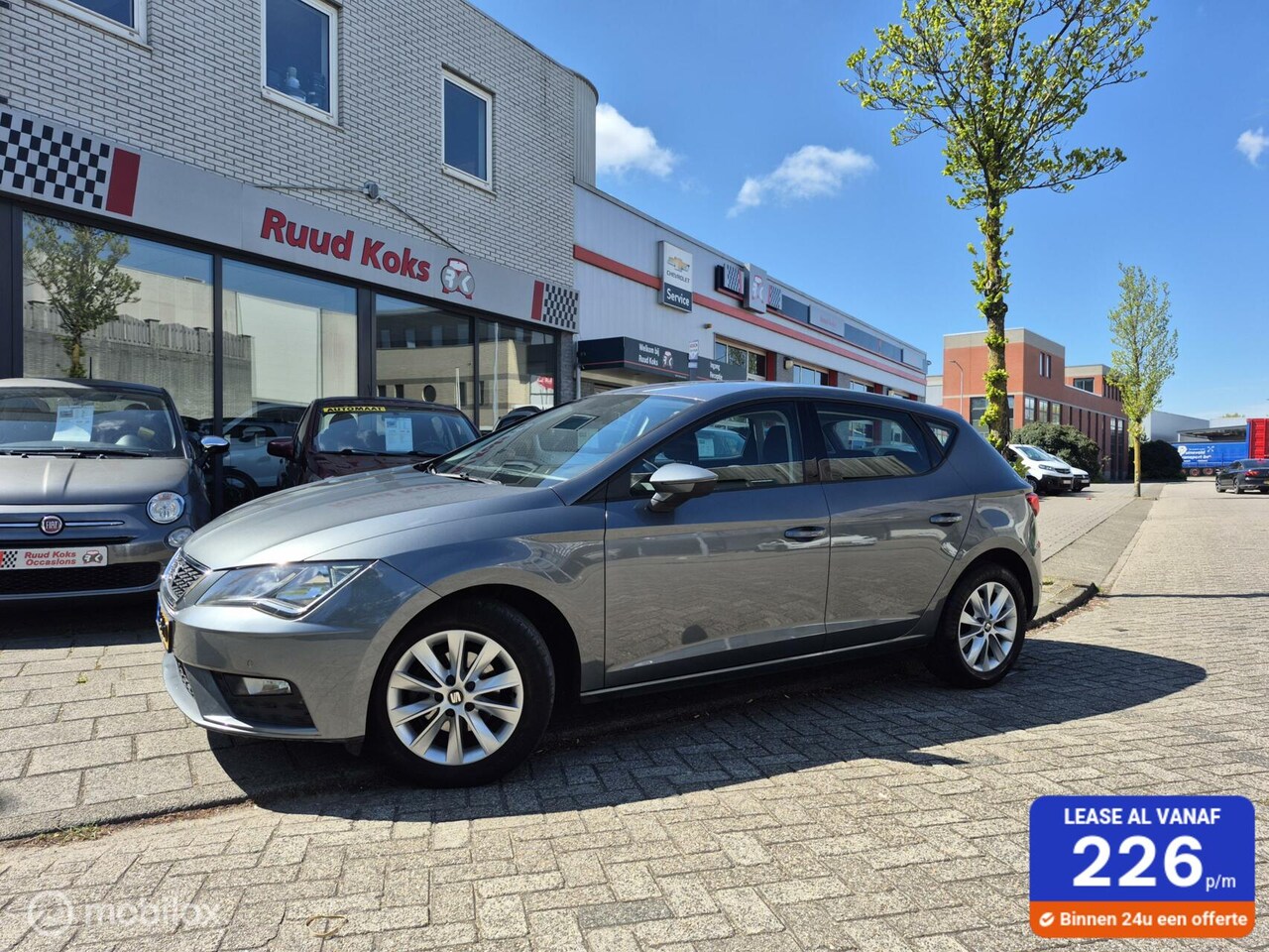 Seat Leon - 1.2 TSI STYLE BUSINESS / Cruise Control / Carplay / - AutoWereld.nl