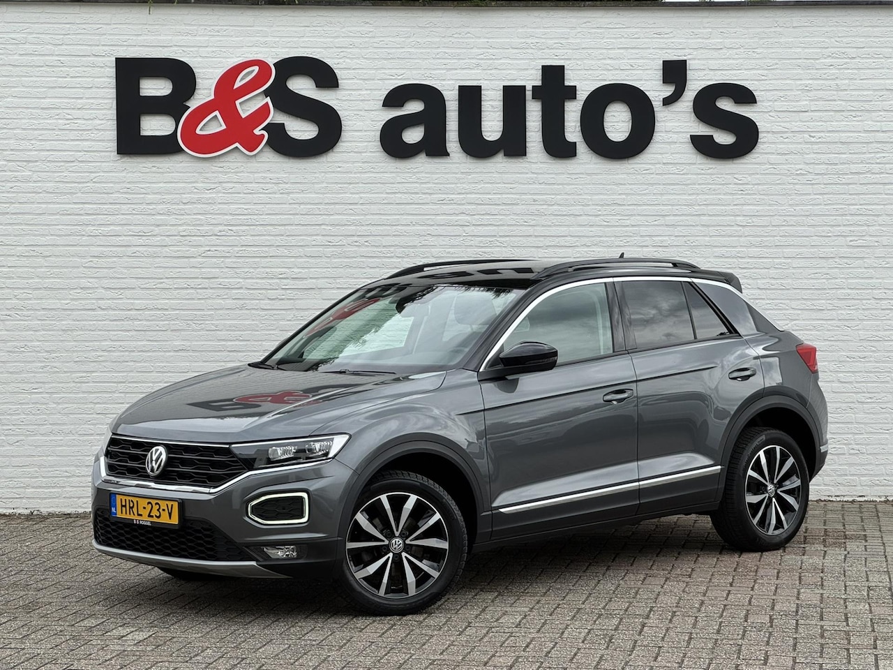 Volkswagen T-Roc - 1.5 TSI Sport Led Adaptive cruise Navigatie Pdc voor+achter Clima Stoelverwarming DAB - AutoWereld.nl