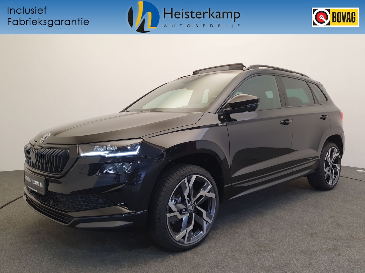 Skoda Karoq - 1.5 TSI 150pk DSG/AUT Sportline Wegklapbare trekhaak, Panoramadak, 19'' velgen - AutoWereld.nl