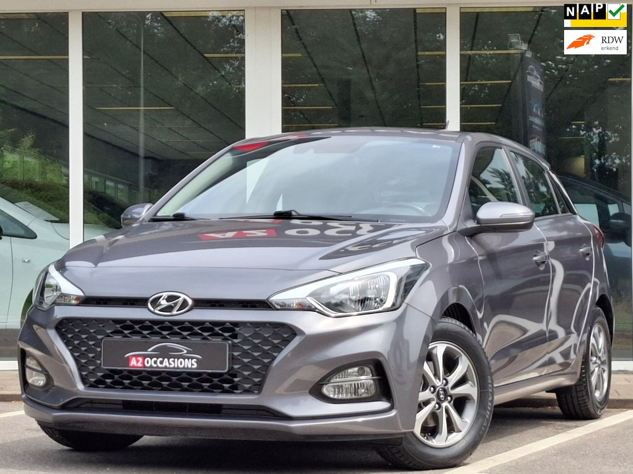 Hyundai i20 - 1.2 4 Cilinder 1e Eig.Cruise/Bluetooth/PDC/Stoel en stuurverwarming! - AutoWereld.nl
