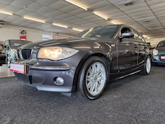 BMW 1-serie - 118i High Executive. LEES TEKST