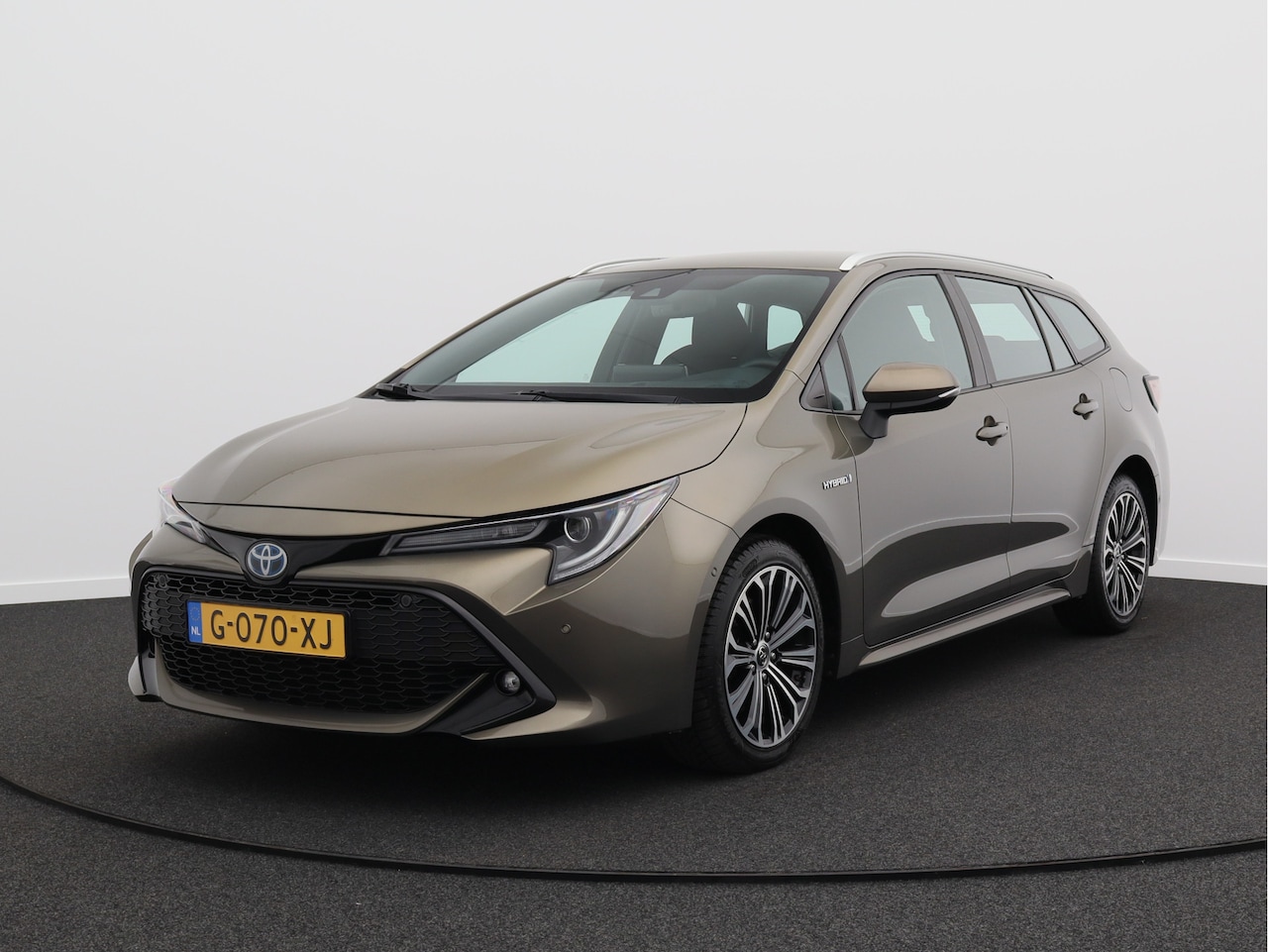 Toyota Corolla Touring Sports - 2.0 Hybrid Business Intro/ lage km/ zeer mooi! - AutoWereld.nl