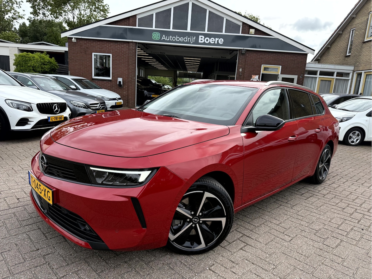 Opel Astra Sports Tourer - 1.6 Turbo Hybrid Stoel/Stuur Verwarming, Camera, App Connect - AutoWereld.nl