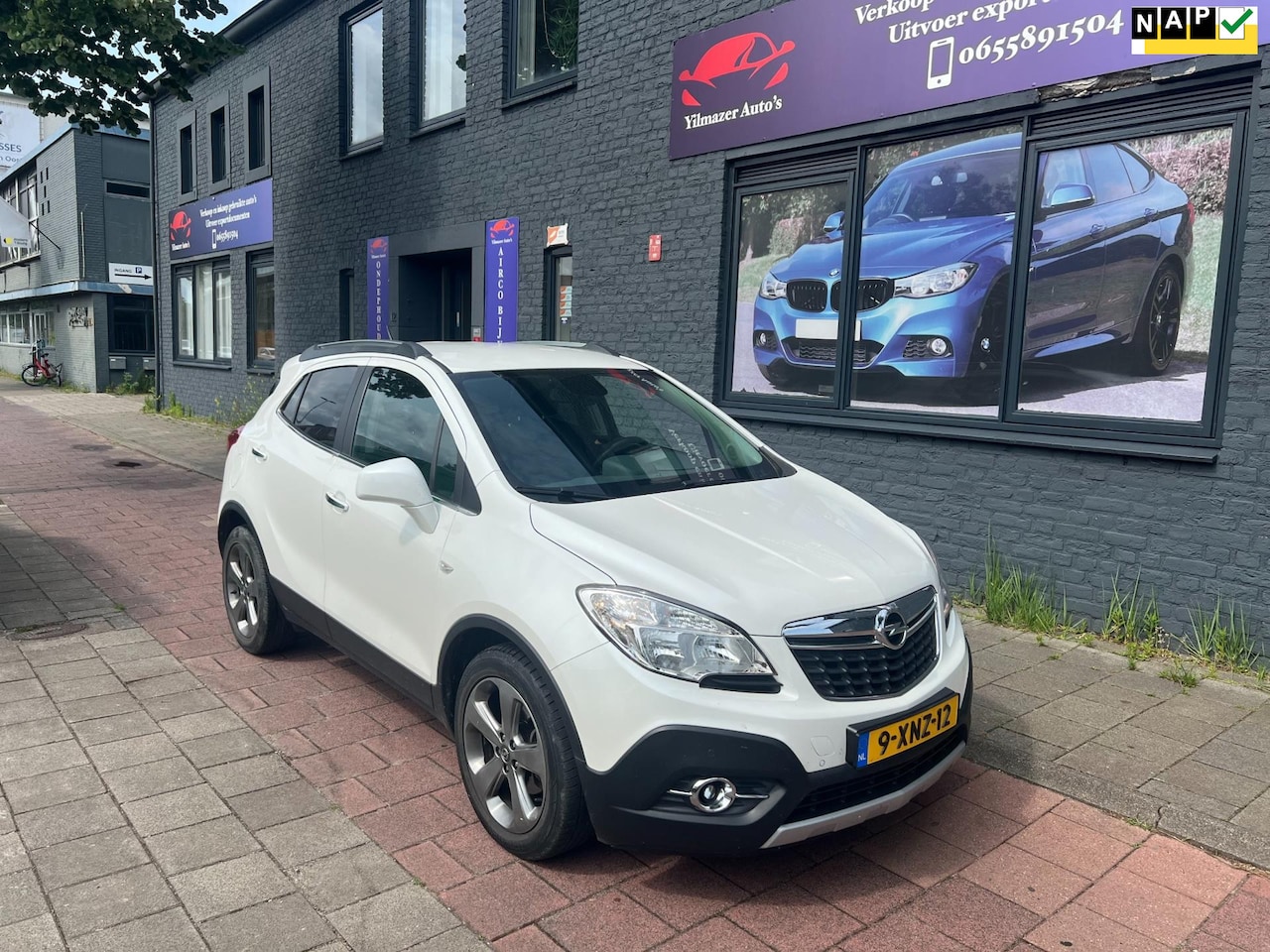 Opel Mokka - 1.4 T Cosmo navi camera leder nap boekjes - AutoWereld.nl