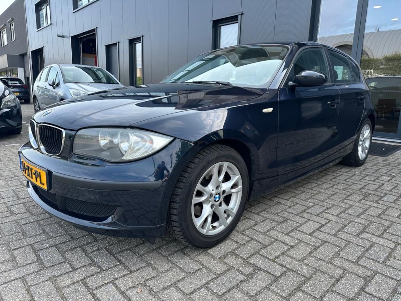 BMW 1-serie - 116i Clima, Navi, LM-velgen, 6-Bak - AutoWereld.nl