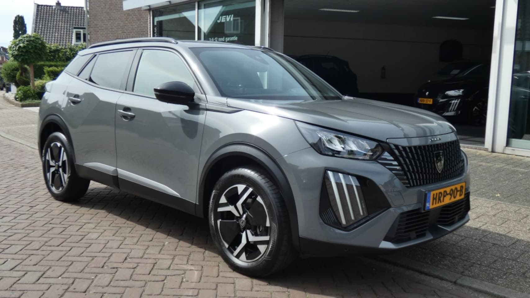 Peugeot 2008 - 1.2 ALLURE  AUTOMAAT  *   NAVI * CRUISE * APPLE-CARPLAY * L.M.V 17 * CAMERA * - AutoWereld.nl