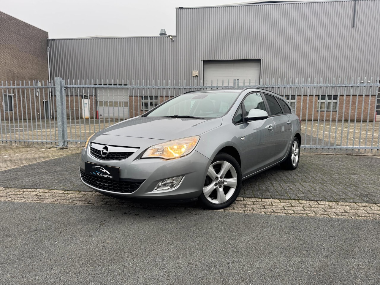 Opel Astra Sports Tourer - 1.4 Turbo Edition NAP - AutoWereld.nl