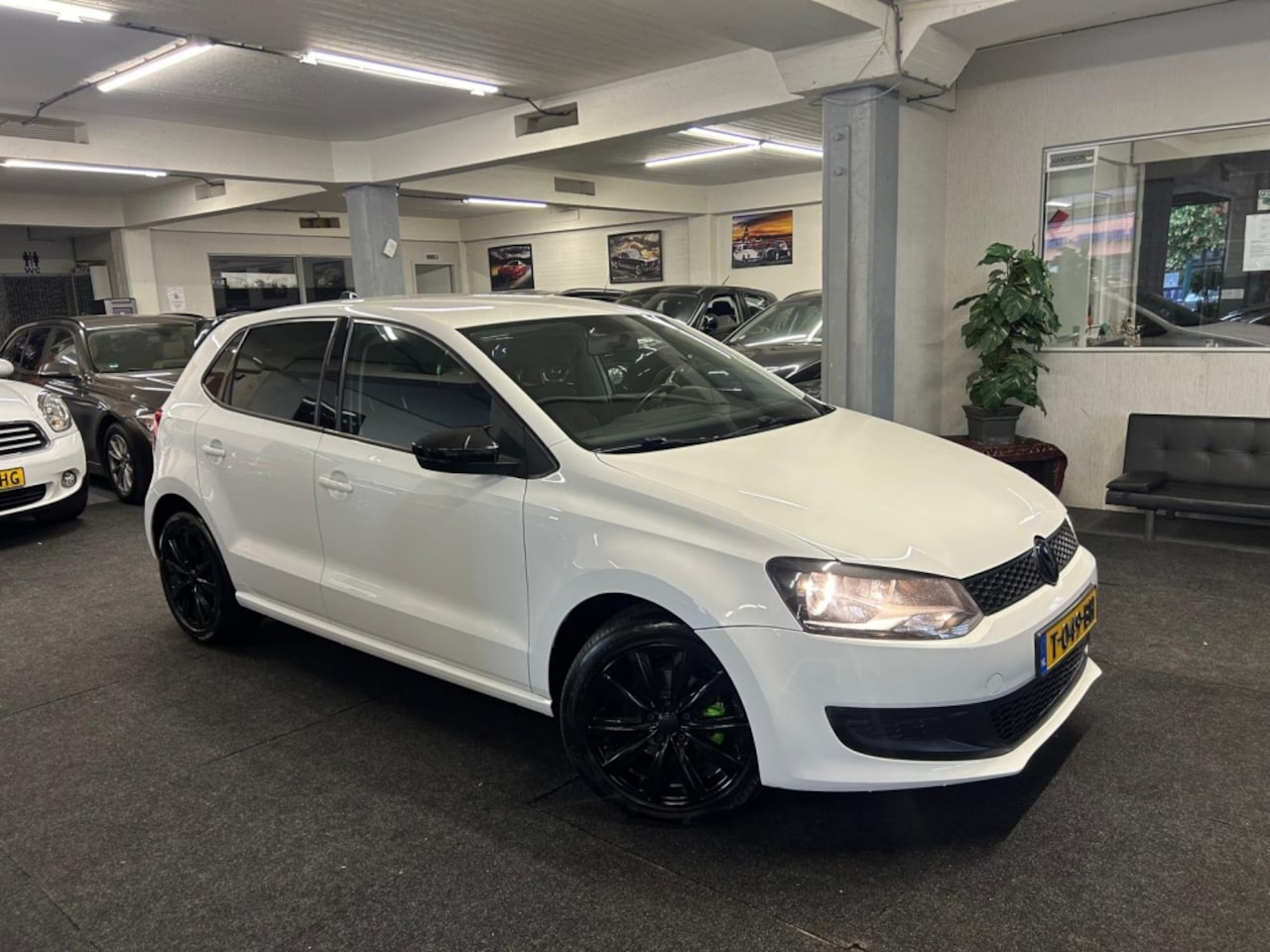 Volkswagen Polo - 1.2-12V*Sportief*5drs*Airco*Velgen - AutoWereld.nl
