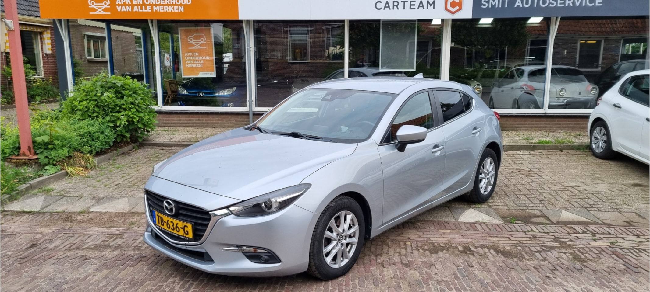 Mazda 3 - 2.0 SkyActiv-G 120 SkyLease+ Navi Climat Cruise Pdc Lmv Head up - AutoWereld.nl
