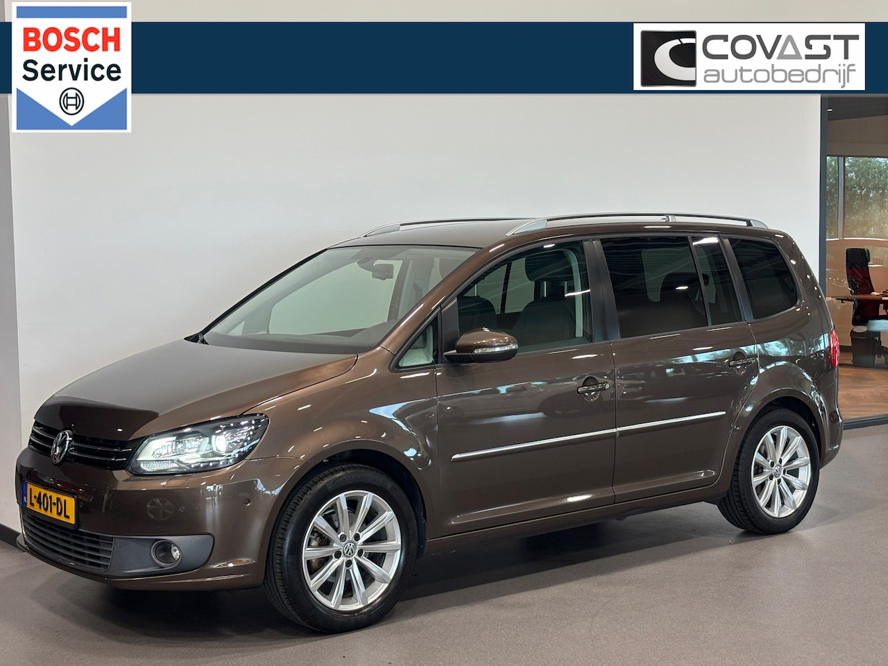 Volkswagen Touran - 1.4 TSI Highline 5P. Navigatie|Alcantara|PDC|Xenon|Parkeerhulp - AutoWereld.nl